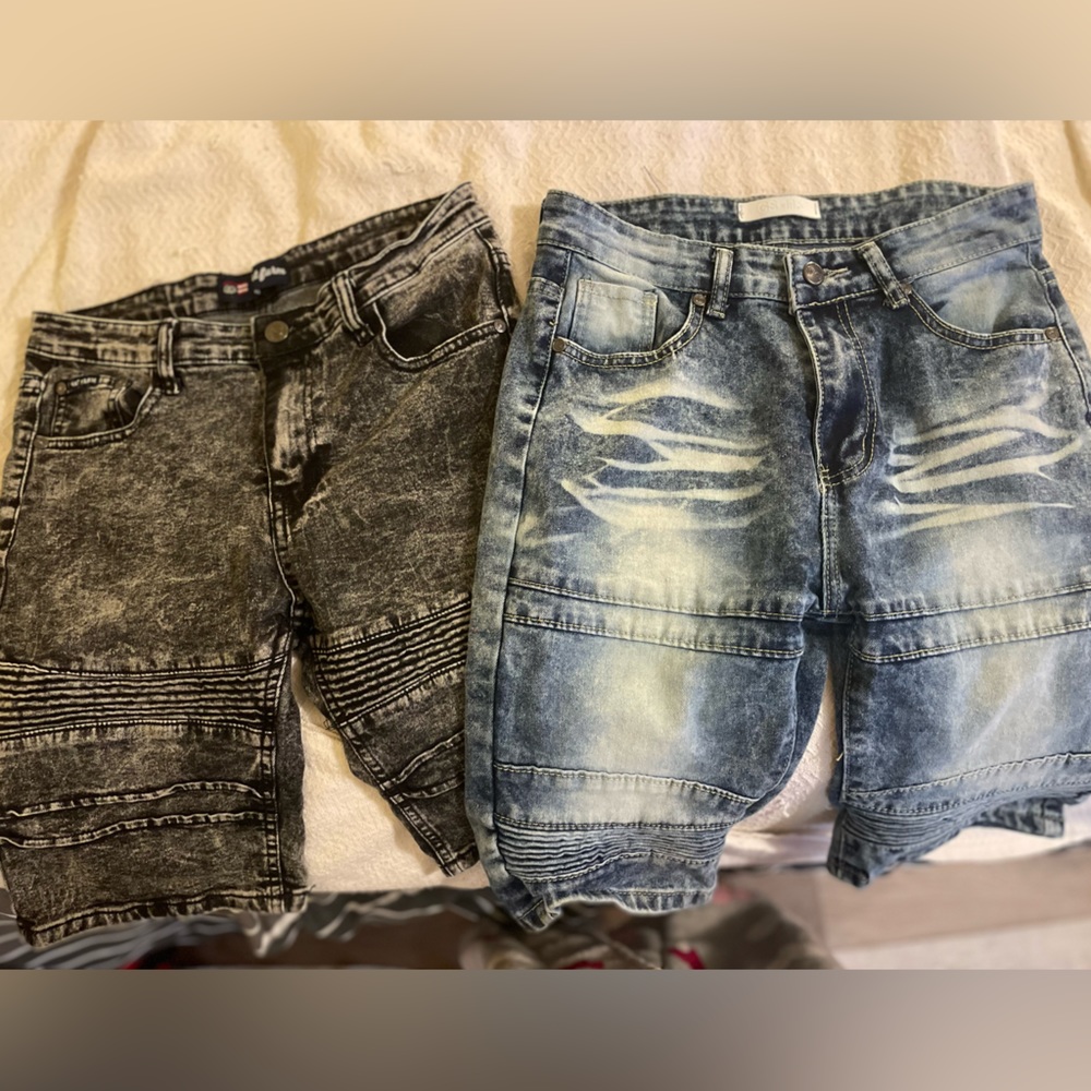 2 pair boys jean shorts. Worn less than 2 times. Blue size 16, black size 18.